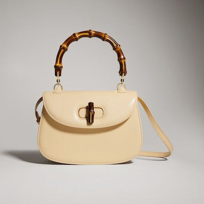 Women's Small Top Handle Bag With Soft Grainy Leather And Click Closure