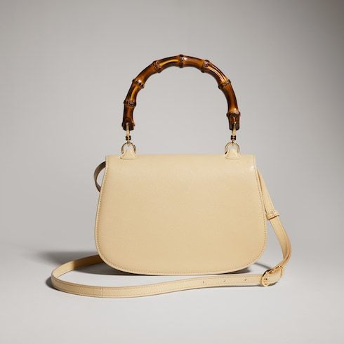 Women's Small Top Handle Bag With Soft Grainy Leather And Click Closure