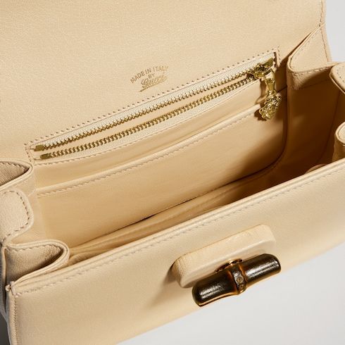 Women's Small Top Handle Bag With Soft Grainy Leather And Click Closure