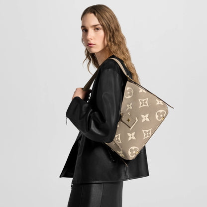 Women's CarryAll PM Bicolor Monogram Empreinte Leather Hobo Bag M47180