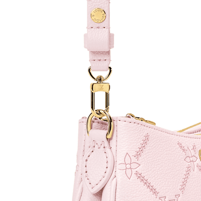 Women's Pochette Liv Light Bliss Couture Monogram Empreinte Leather Bag M29495