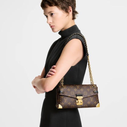 Women's Trunkie East West Monogram Canvas Baguette Bag